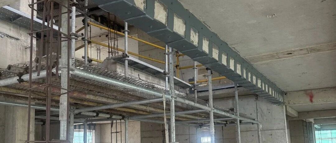 Public Housing: Steel Plate + CFRP Reinforcement
